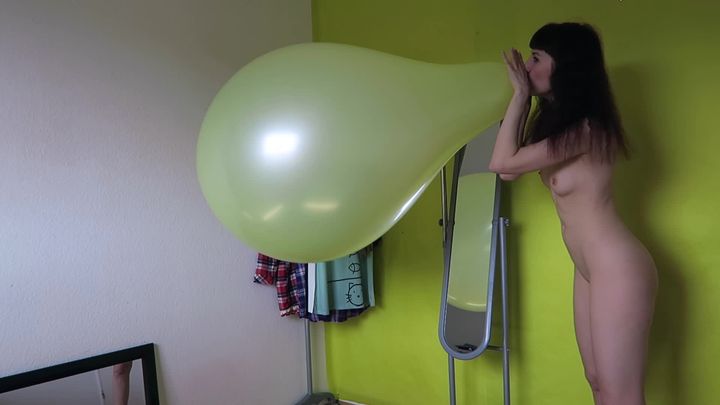 Blowing to pop 36 inch balloon