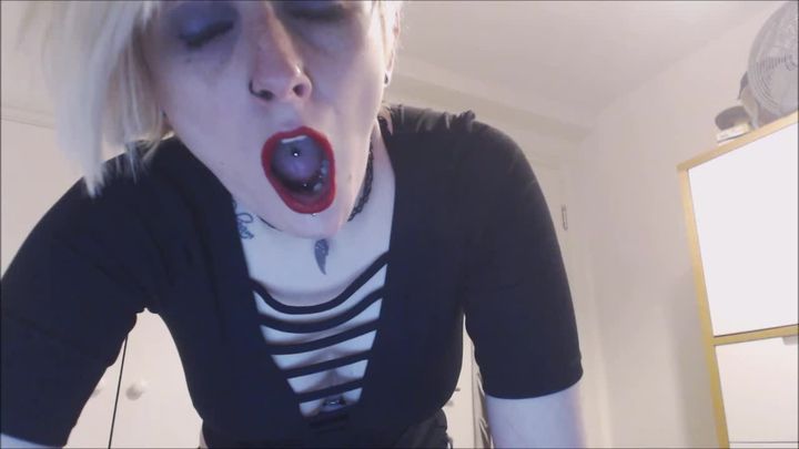 Red Lipped Pixie Yawns Upclose