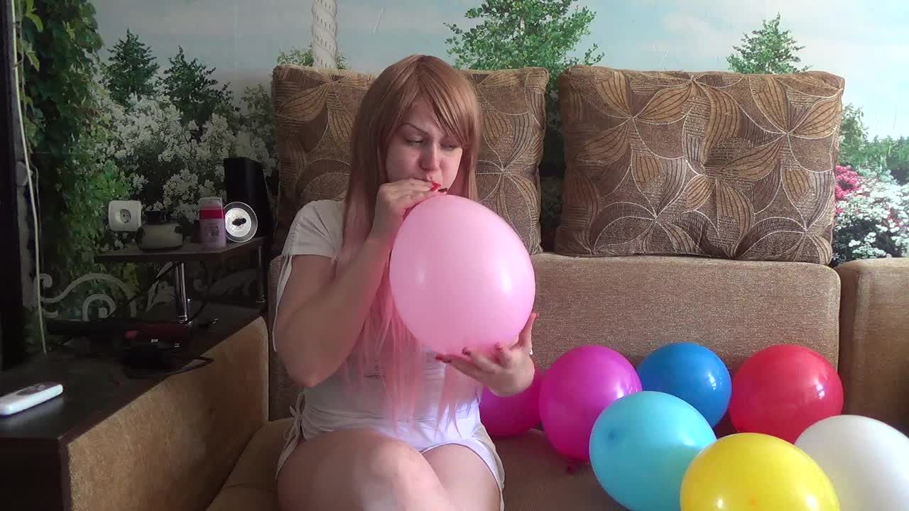 i am blowing 10 different color balloons