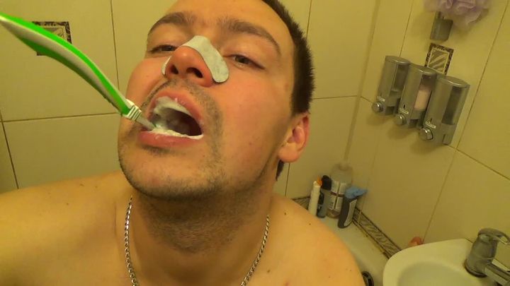 Alex sloppy brushing his teeth with nose