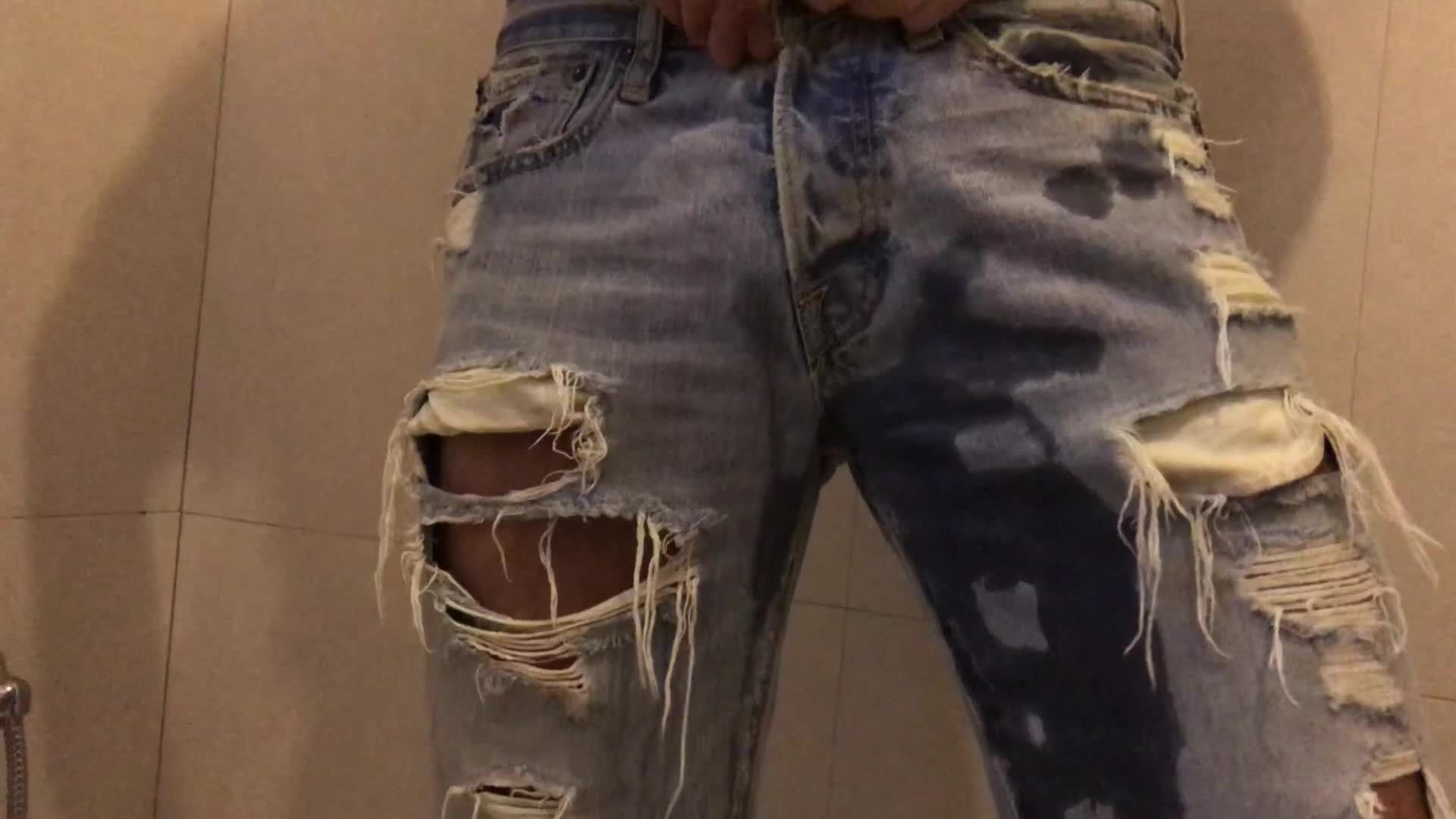 my big cock peeing in my ripped jeans