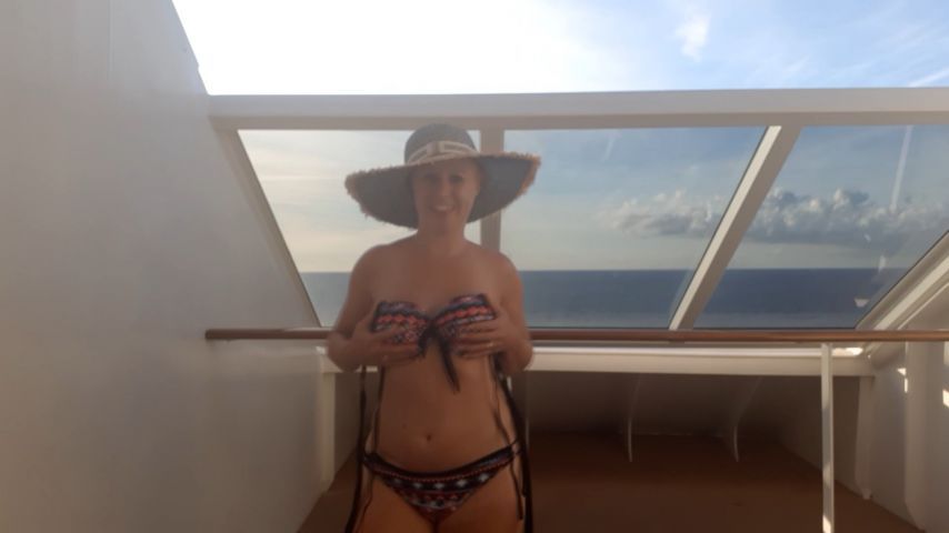 Naughty balcony wank on a ship