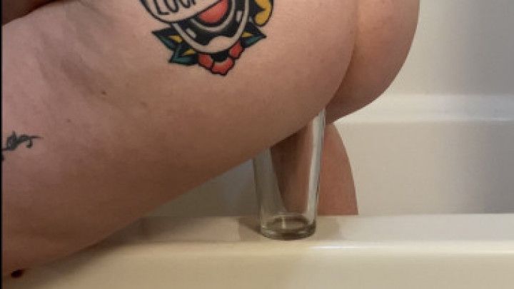 Piss in glass and pouring on tits