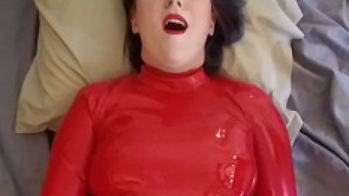 Red latex bodysuit drenched in squirt