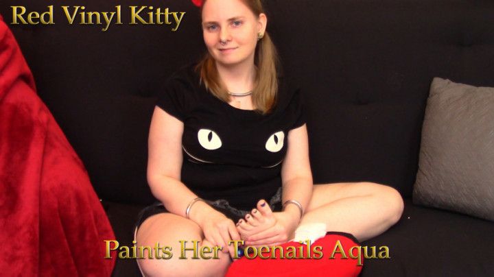 Red Vinyl Kitty Paints Her Toenails Aqua