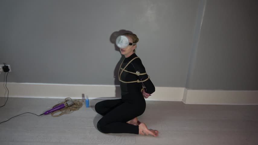 Wetsuit Bondage with Butt Plug and Wand