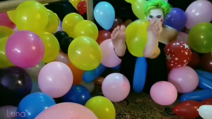 Clown Fantasies Among Balloons