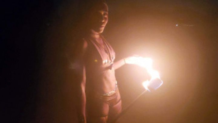 Nude fire dancing