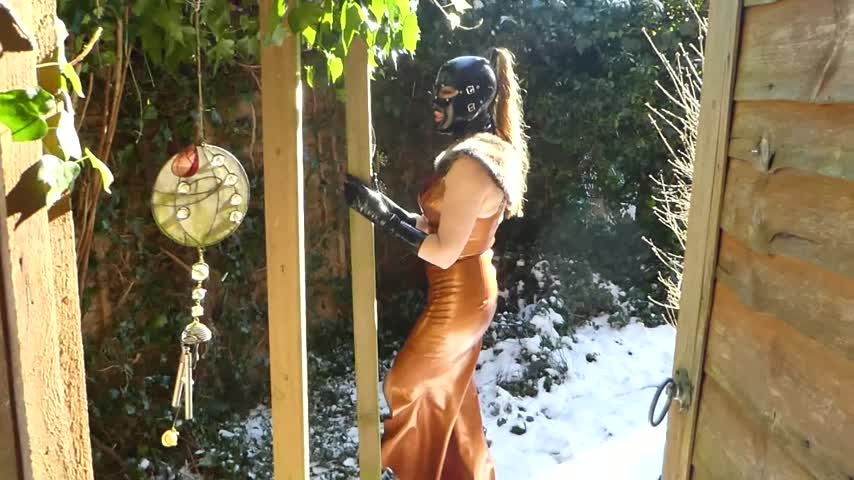 Latex Model playing in the snow