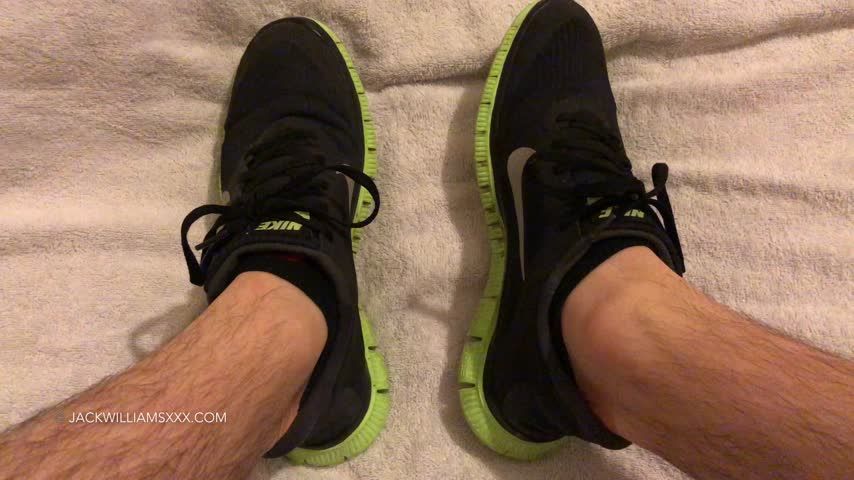 Nike Sneakers, Black Socks, And Feet