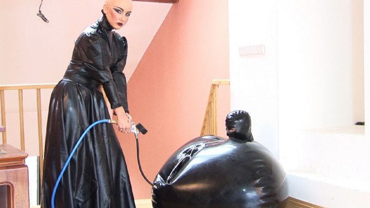 slave caught in a closed latex balloon