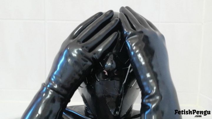 Saliva mess in latex mask and gloves