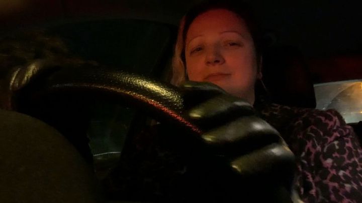 Another driving wearing leather gloves