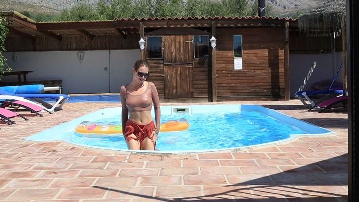 Wet clothing lilo pool fun in Spain