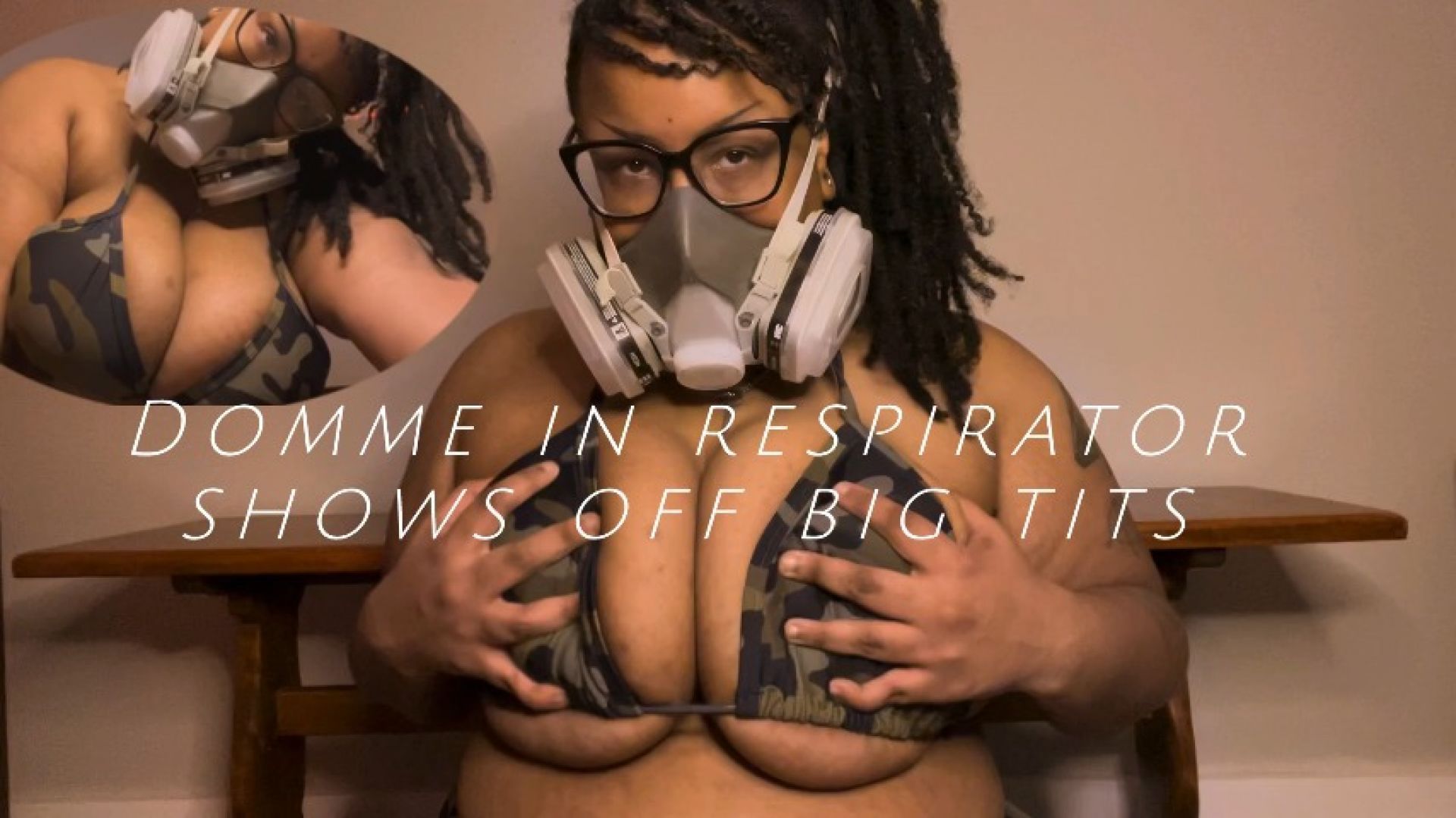 Domme in Respirator Shows off Big Tits