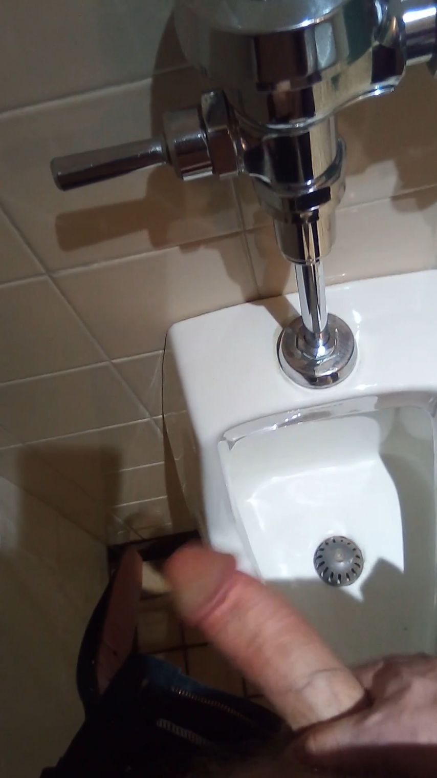 Public urinal stroking