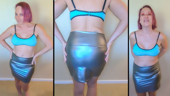 Trying On A Shiny Silver Skirt