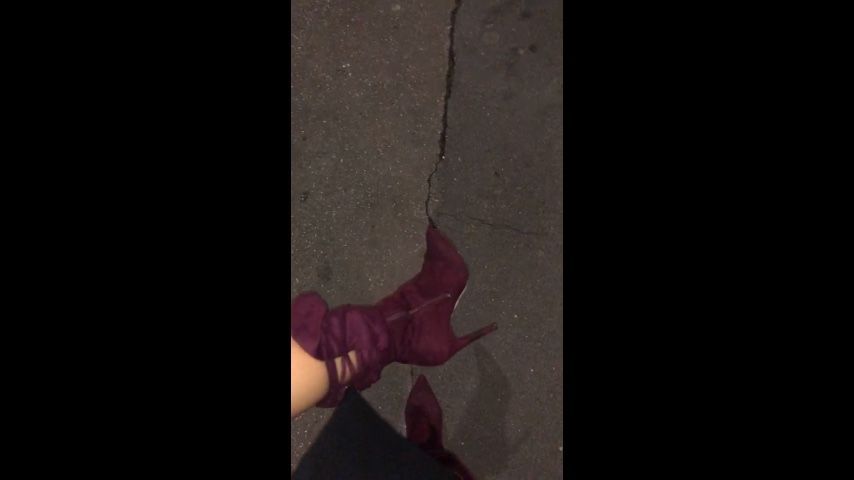 Walking on the road with new sexy boots