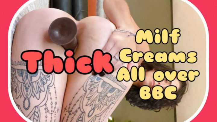 Tatted milf gets creamy on bbc