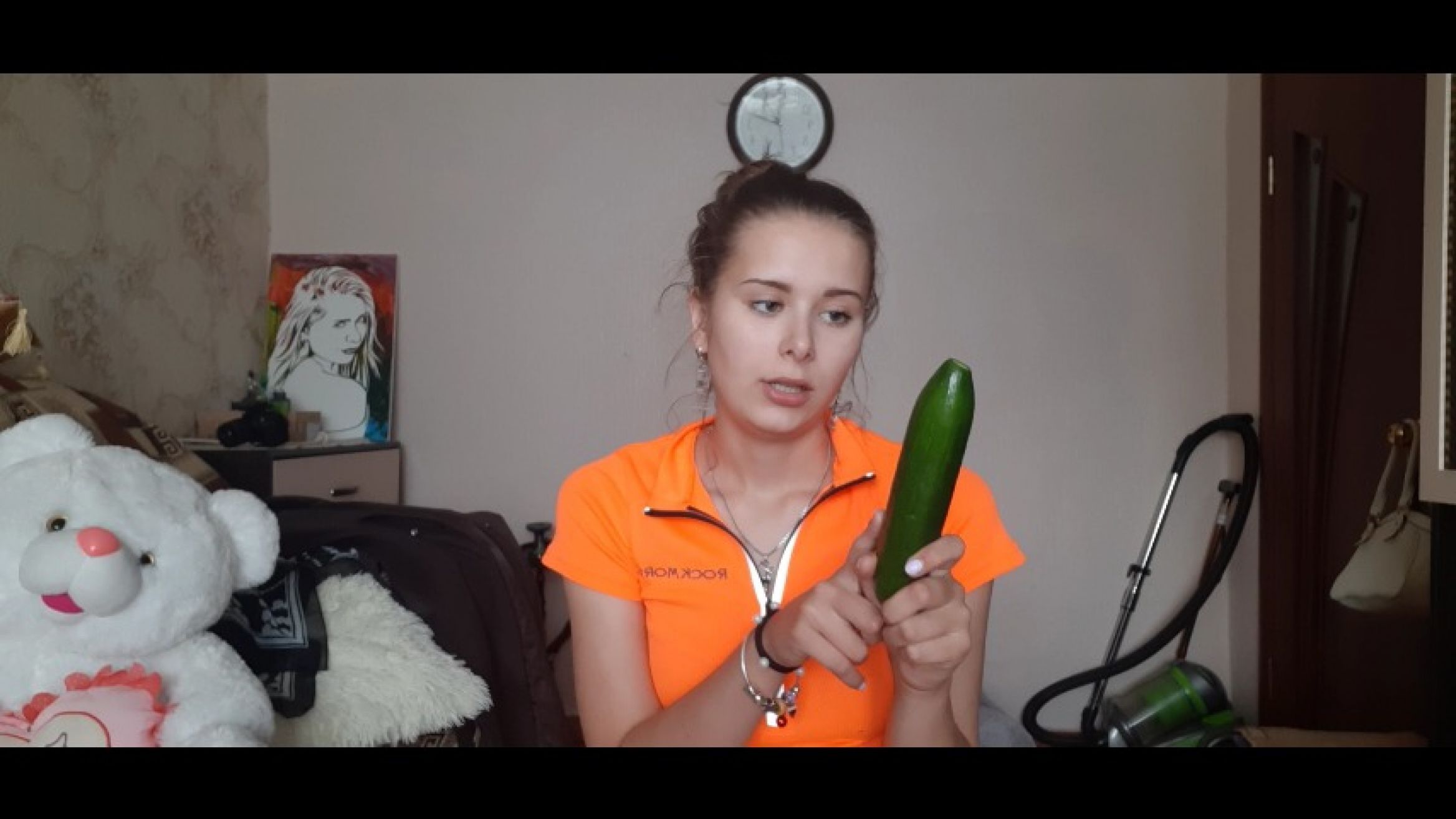 Guess what I am doing with my cucumber