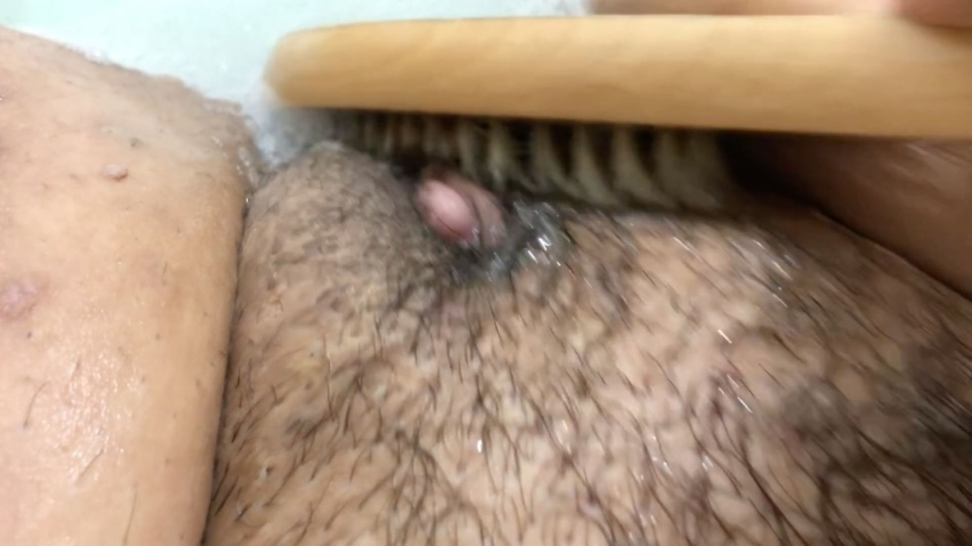 Bath time CBT with a shower brush