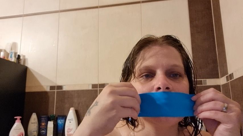 Selfgag with blue kinezio tape