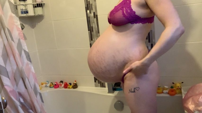 Oiling massive pregnant bump 9 months