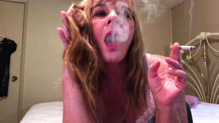 Smoking while I play with my long hair