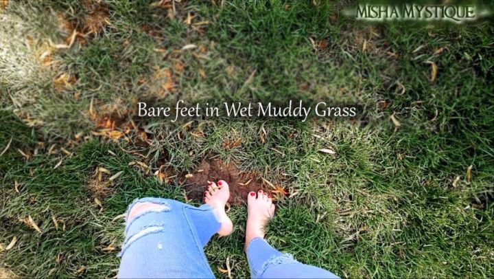 Bare feet in Wet Muddy Grass