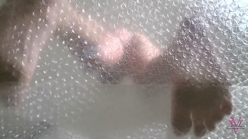 Bare foot bubble wrap popping