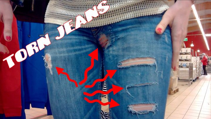 Torn old jeans in public