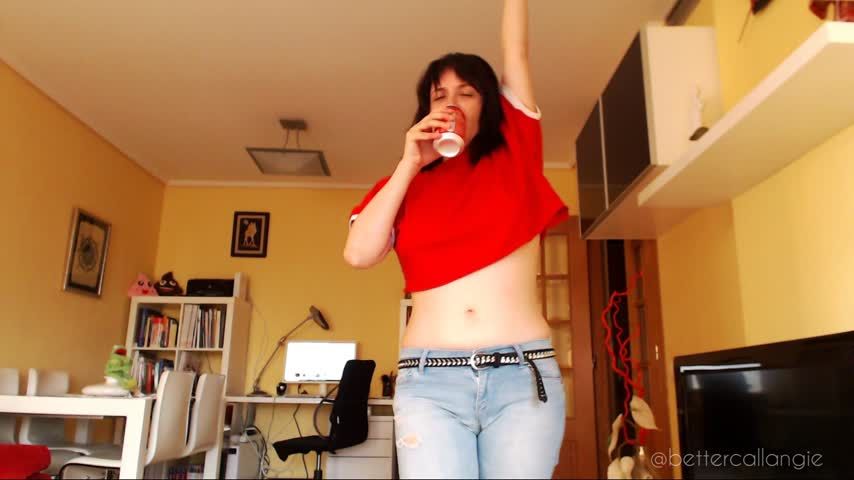 Burps in a crop tshirt and showing belly