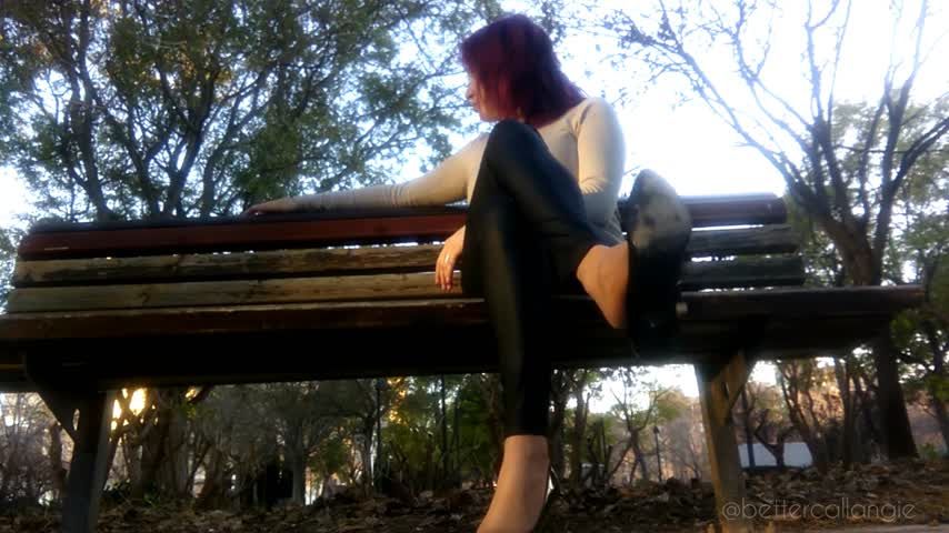 Dangling my black pumps in the park