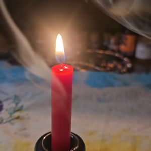 Firelight on Red  Candle Aesthetic Shot