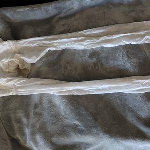 Dirty worn white pantyhose