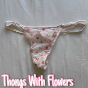 Worn Thongs With Flowers