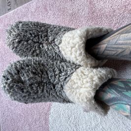 used and worn Lambskin shoes slippers