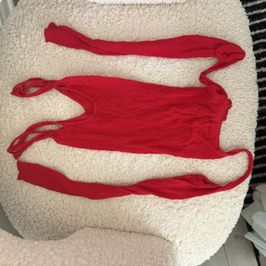 Bright red full body suit