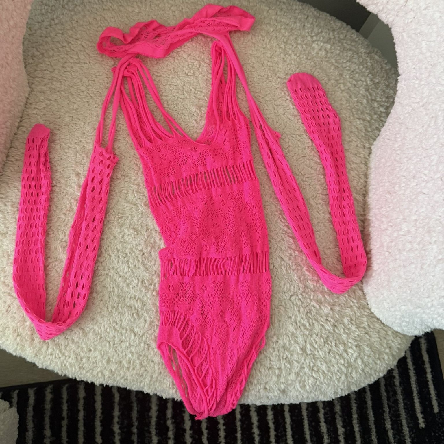 Hot pink fishnet body stocking