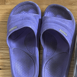 Dirty Worn Purple Flip Flops