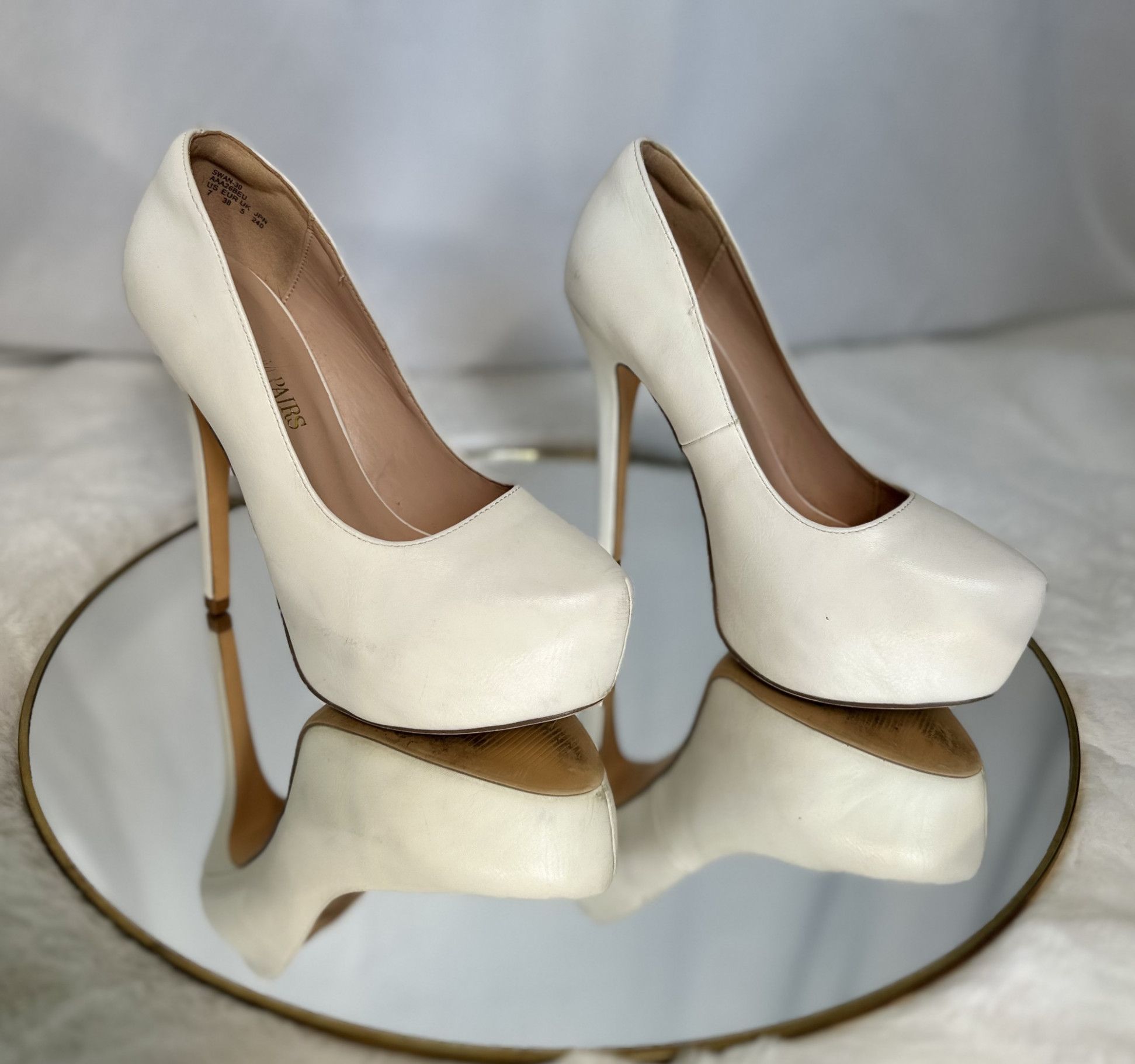 White platform heels
