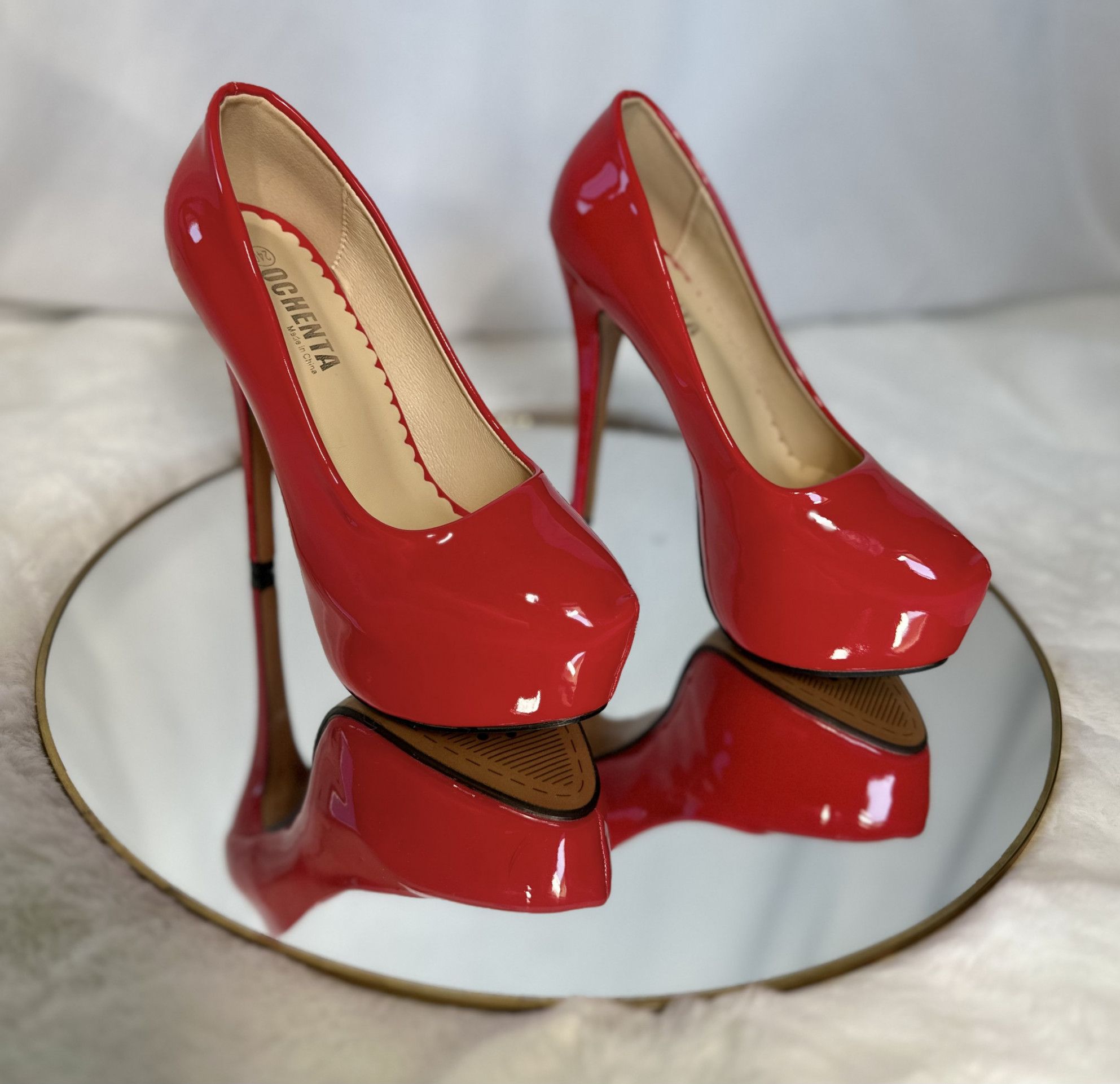 Red patent platform heels