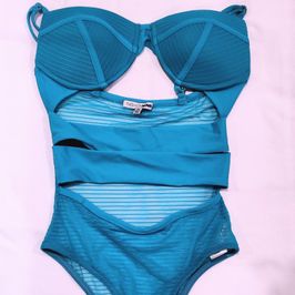 Natalia Queen worn turqoise bodysuit