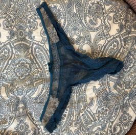 Blue lace thong panties worn
