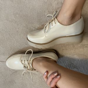 Shiny platform shoes