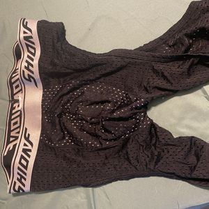 Worn athletic mesh boxers