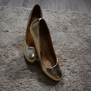 Golden high heels