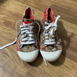 Worn designer sneakers