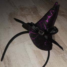 Tiny purple and black witch hat on alice band