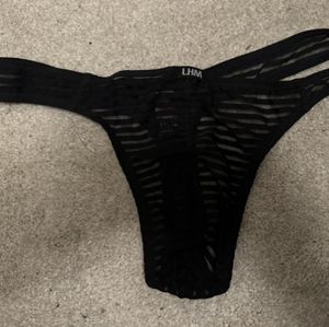 See through black striped thong